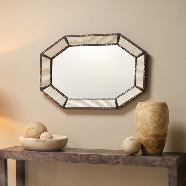 Camden Carved Bone Mirror Hanging Horizontally above console table