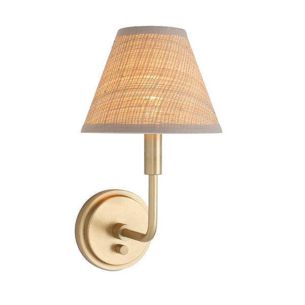 Polly Sconce with Rattan Shade illuminated