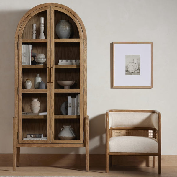 Amelia Oak Cabinet styled with books and objects