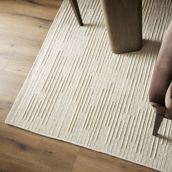 Gianni Ivory Rug styled in dining room