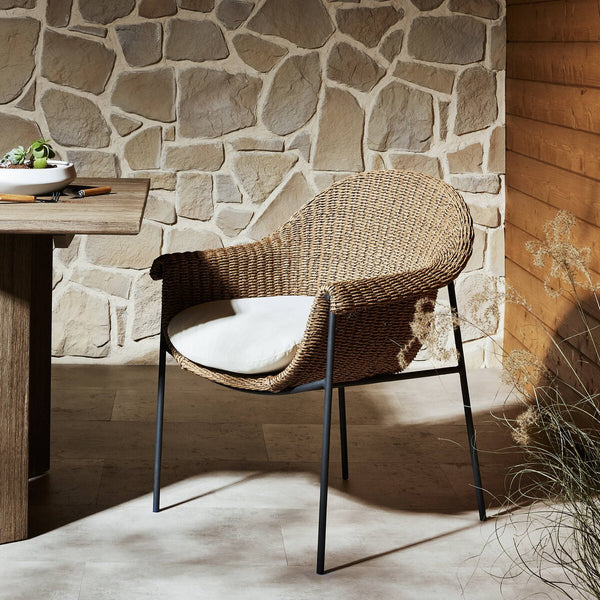 Sagrado Outdoor Dining Chair styled on stone patio