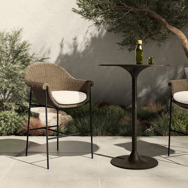 Sagrado Outdoor Bar Stool styled at table on patio