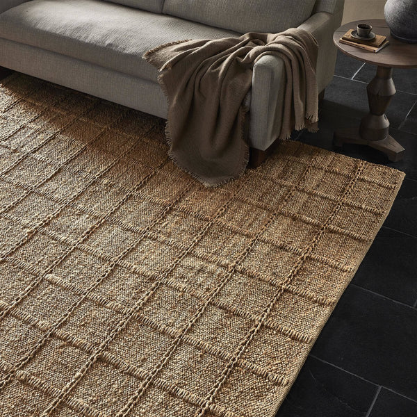 Grid Natural Jute Rug styled with grey sofa