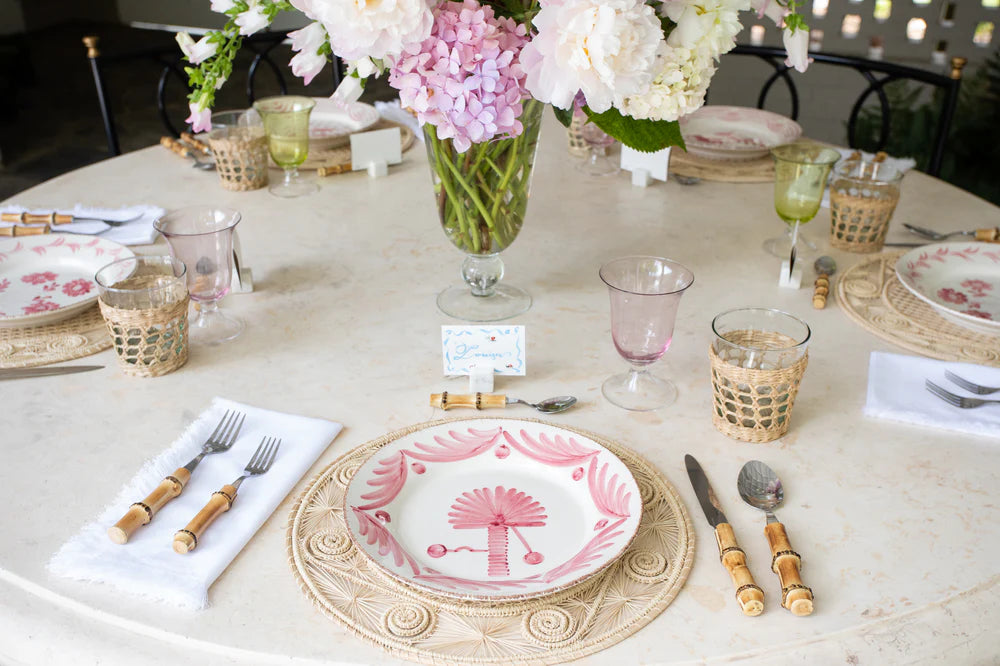 Casa Nuno Pink Palm Plate styled on table - Elizabeth Cook