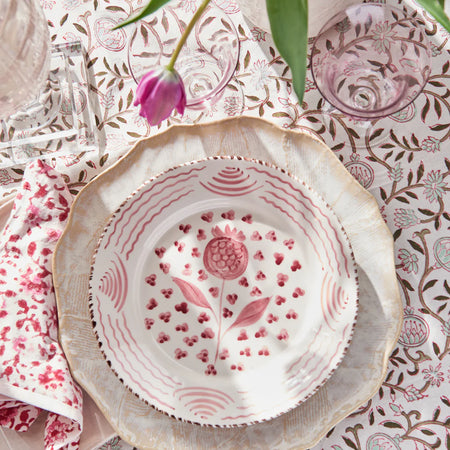Casa Nuno Pink Pomegranate Plate styled with tulips