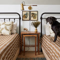 Novel Wall Sconce Patina Brass Styled in Bedroom - Lauren Liess