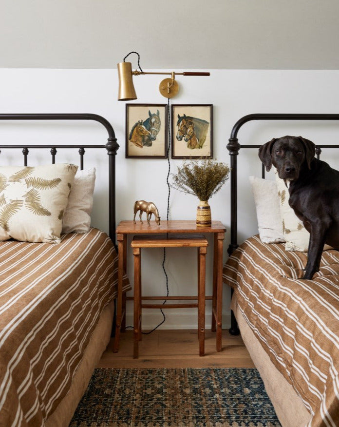 Novel Wall Sconce Patina Brass Styled in Bedroom - Lauren Liess