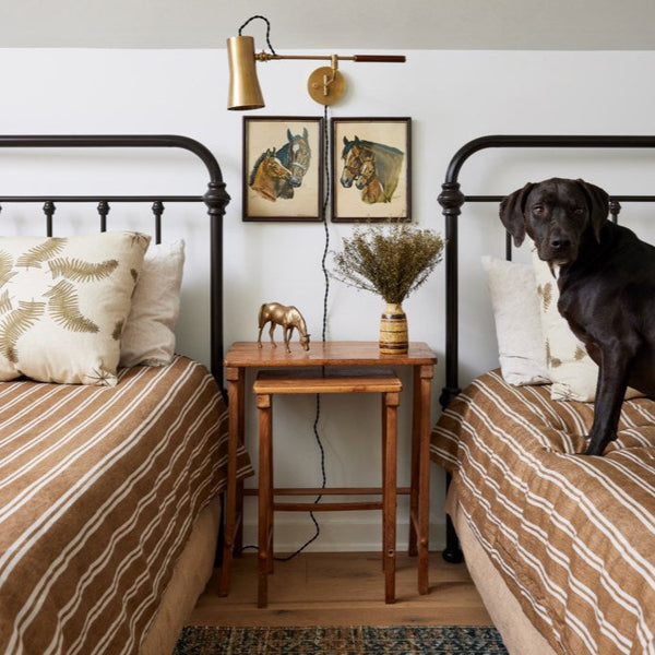 Novel Wall Sconce Patina Brass Styled in Bedroom - Lauren Liess