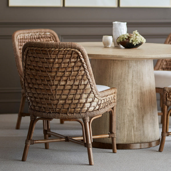 Palecek Capitola Rattan Side Chair styled with round dining table