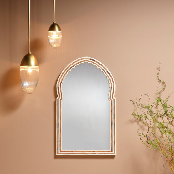 Banda Bone Mirror shown with pendant lights for scale