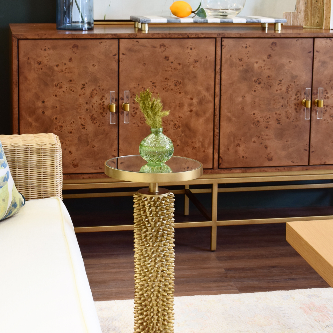 Albert Dark Burl Buffet styled in living room