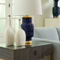 Aristide Blue Lamp styled on side table