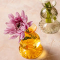 Joie Yellow Glass Bud Vase with pink flower