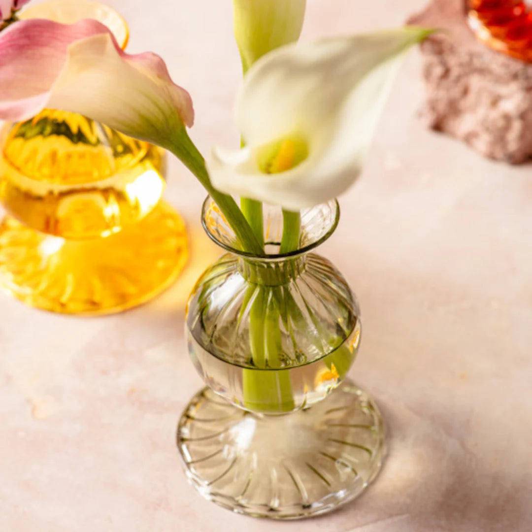 Joie Green Glass Bud Vase styled with calalilies