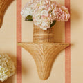 Baytree Natural Wicker Wall Bracket on striped wall