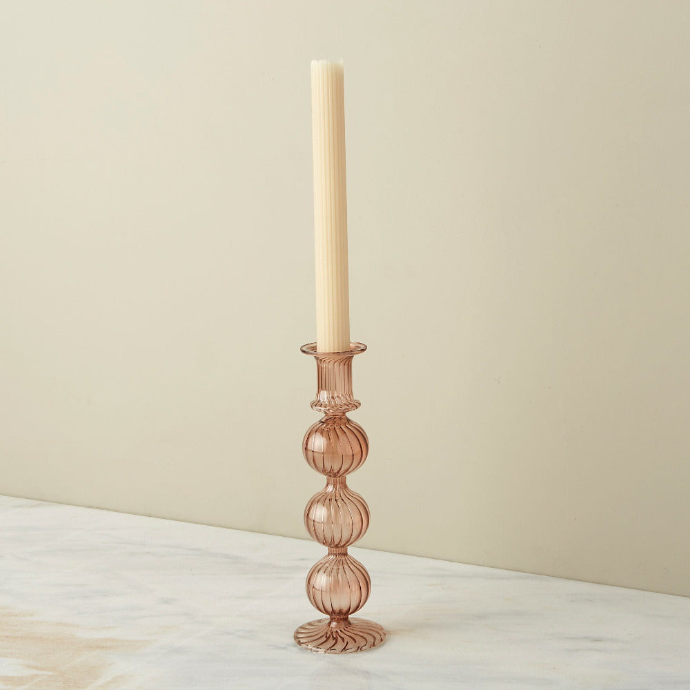 Joie Amber Glass Candlestick styled with candle