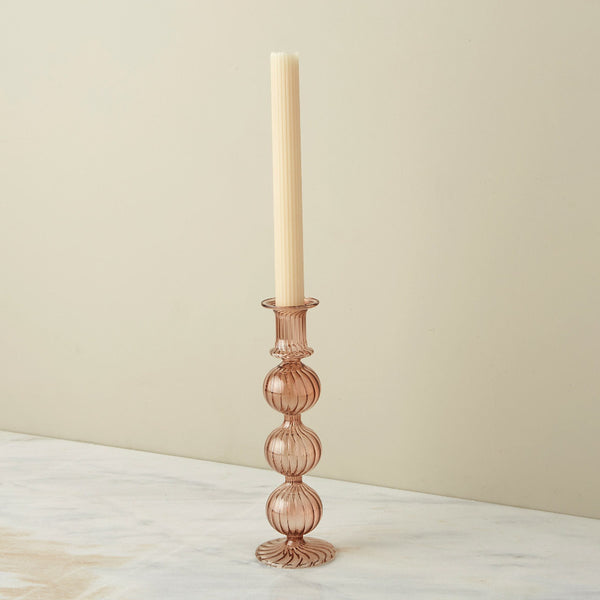 Joie Amber Glass Candlestick styled with candle