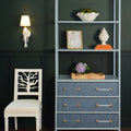 Blakewell Blue Grasscloth Etegere styled in dark green room