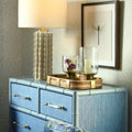 Blakewell Blue Grasscloth and Matte Lacquer Chest styled with rattan tray