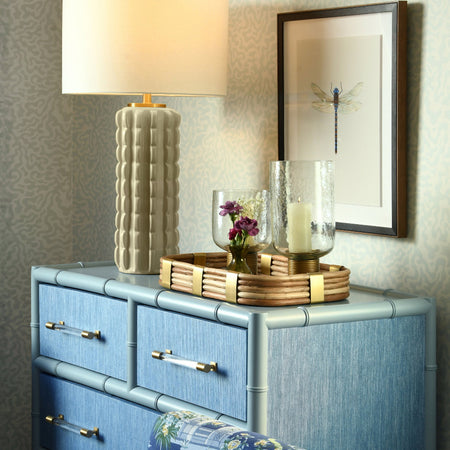 Blakewell Blue Grasscloth and Matte Lacquer Chest styled with rattan tray