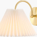 Blanche Pleated Wall Sconce illuminated