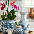 Blue Orchid Pot styled in Salina Oval Rattan Tray on kitchen counter
