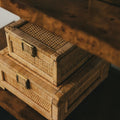 Bray Rattan Boxes styled on burl table