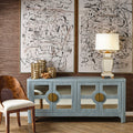 Cape Light Blue Reeded Rattan Buffet styled in moody dining room