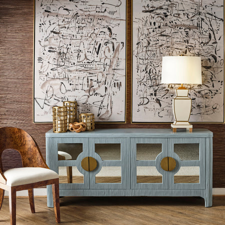 Cape Light Blue Reeded Rattan Buffet styled in moody dining room