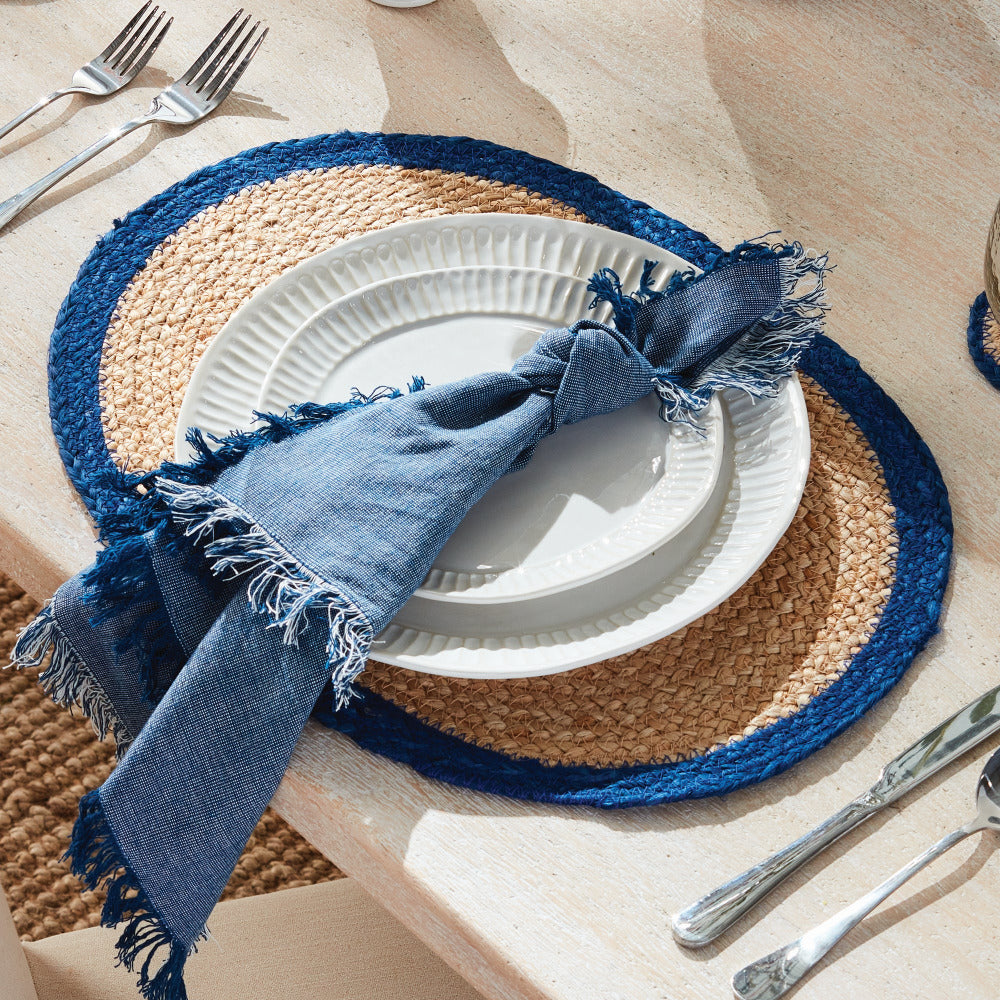 Caribe Jute Coil Navy Border Oval Placemat styled on table