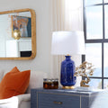 Carolyn Lapis Ceramic Lamp Styled in living room window