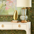 Castella White Console Table styled with lamp