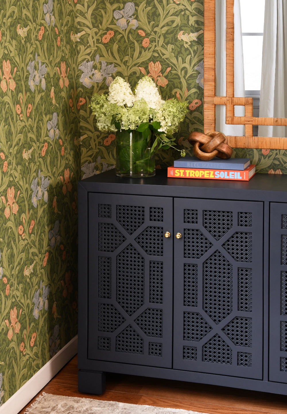 Celia Navy Cabinet styled in wallpapered room