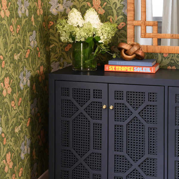 Celia Navy Cabinet styled in wallpapered room