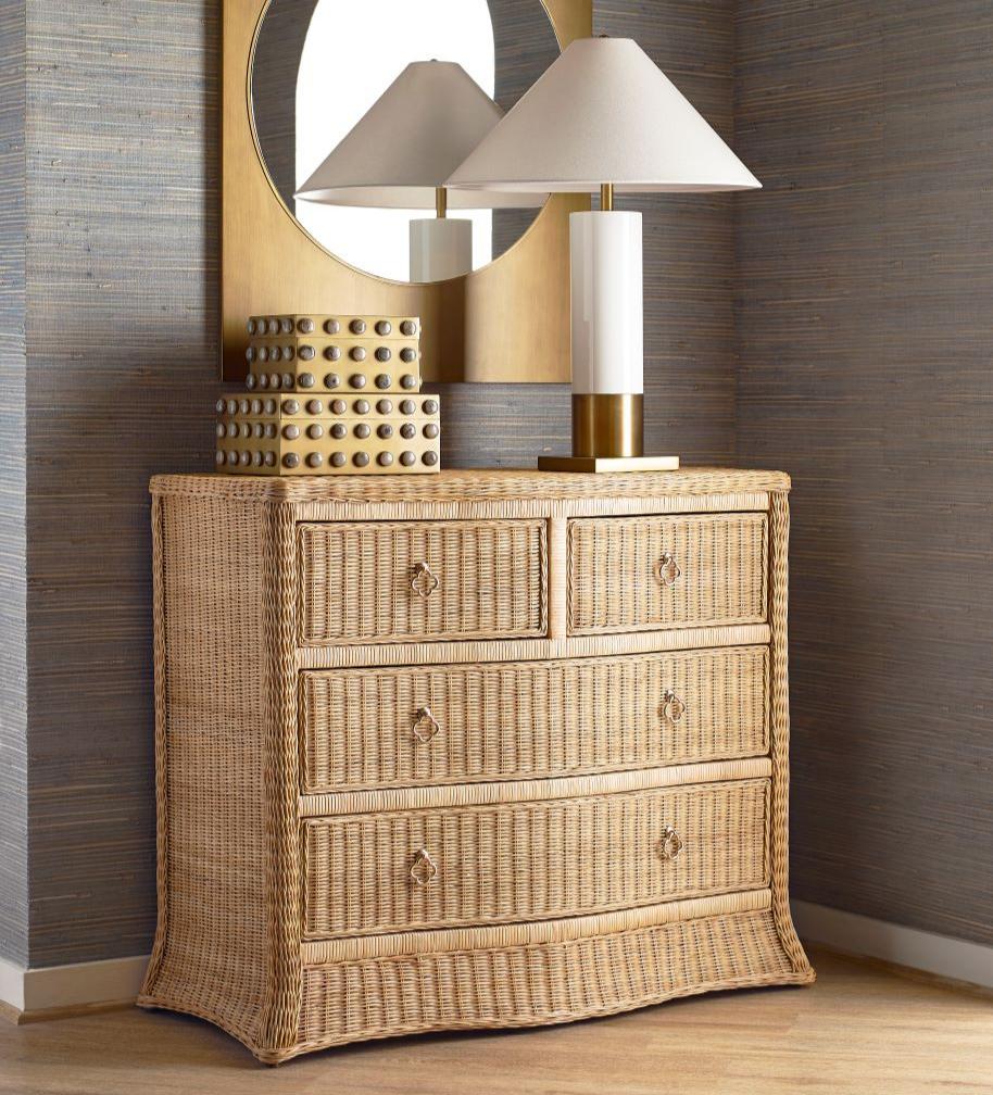 Channing Woven Rattan Chest styled in room with blue grasscloth walls