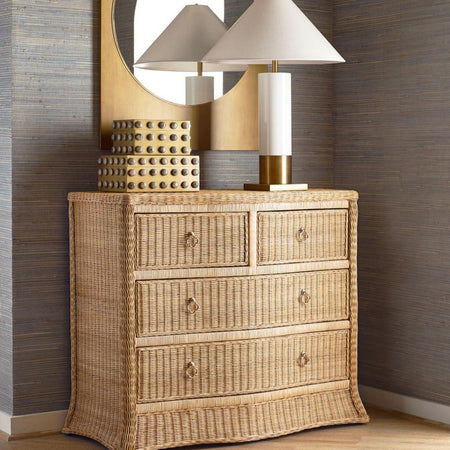 Channing Woven Rattan Chest styled in room with blue grasscloth walls