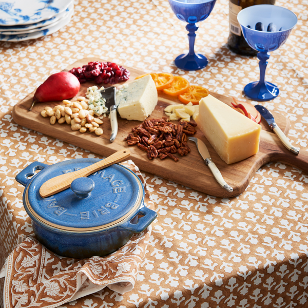 Rialto Duchess Coupe Glass Set styled with Charlotte Caramel Table Linens and Blue Brie Baker