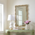 Charlotte Blanc de Chine Lamp on green grasscloth console table