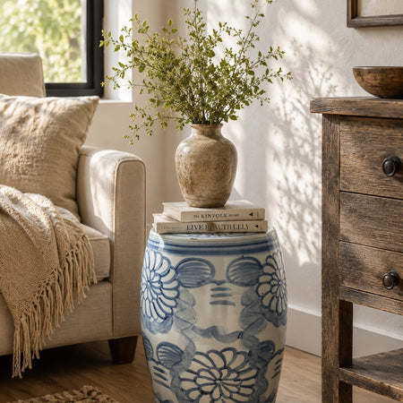 Dahlia Garden Stool styled with books and vase in living room