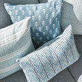Fuji Sky and Yukka Outdoor Pillow Covers styled on patio