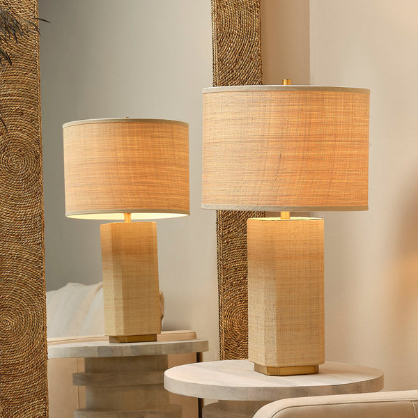 Edisto Raffia Wrapped Table Lamp in front of mirror