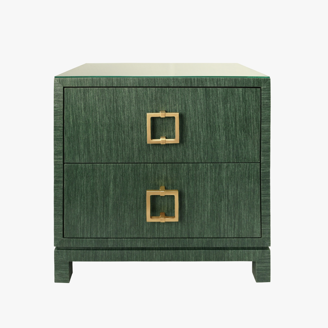 Green nightstand with gold square handles on a white background