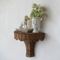 Effie Scalloped Rattan Wall Bracket styled with vase