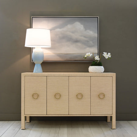Elordi Natural Grasscloth Buffet styled with light blue lamp