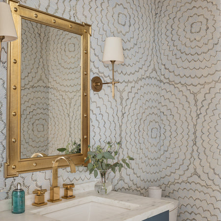 Erin Gates Rivet Gold Wall Mirror in bathroom