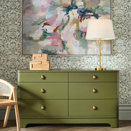 Fleur Olive Dresser styled in wallpapered bedroom