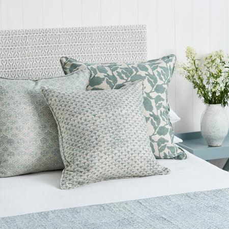 Flores Celadon and Sensu Pillow Cover styled on bed