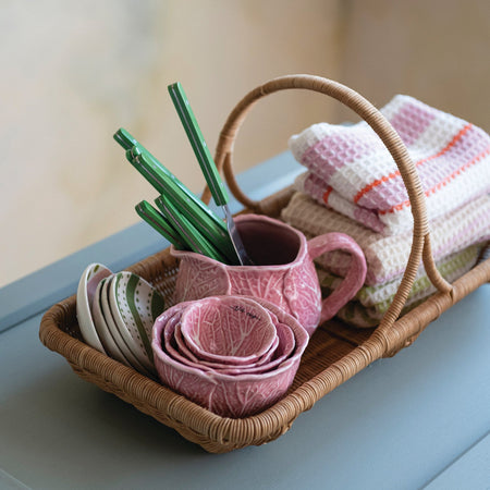 Garden Gathering Basket styled in kitchen with towels and dishes