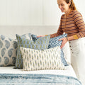 Carezza Moss Azure Pillow Cover Styled on Bed