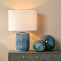 Glenenden Ceramic Table Lamp styled on dresser